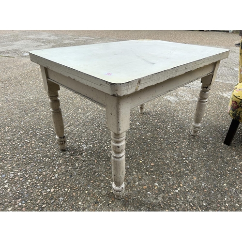 151 - A white painted pine kitchen table with drawer 76x107x70