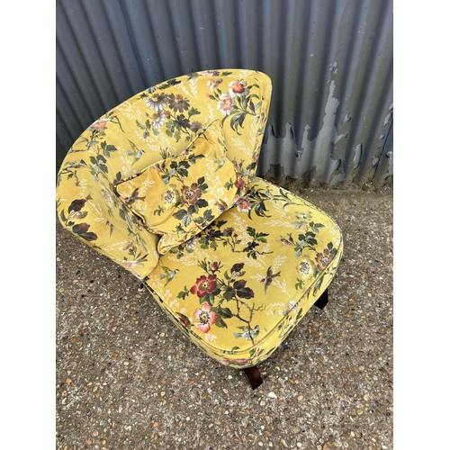 154 - An OASIS floral pattern bedroom chair