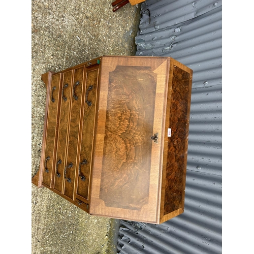 159 - A reproduction walnut bureau