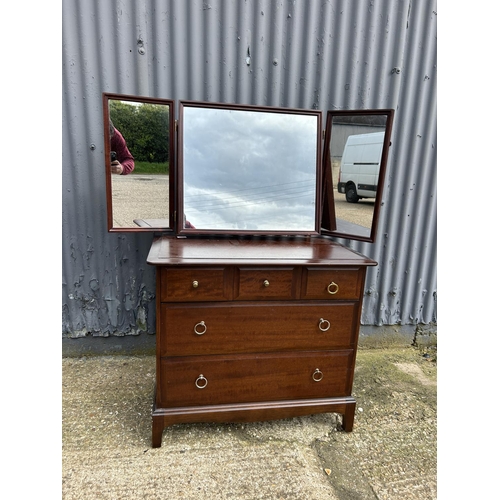 160 - A stag minstrel dressing chest of five drawers