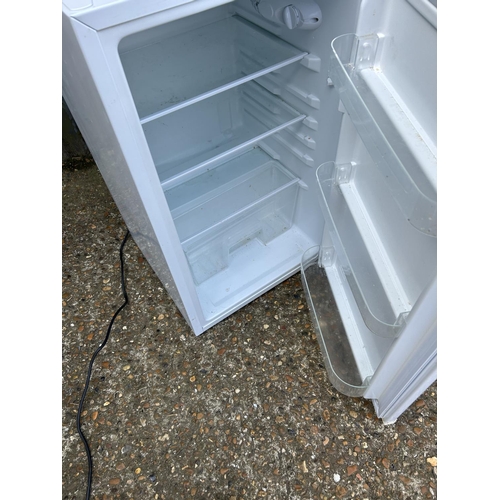 185 - An under counter fridge