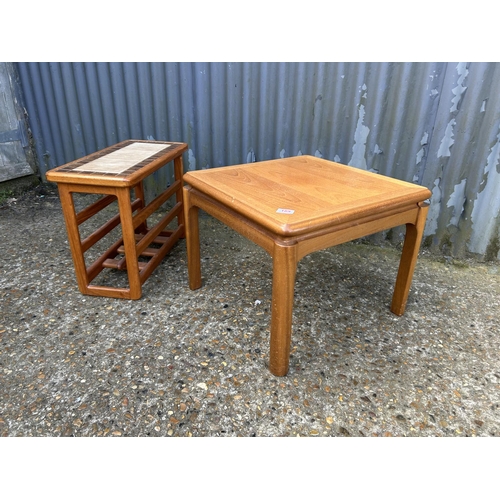 189 - A Parker knoll teak coffee table together with a tile top magazine rack