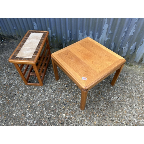 189 - A Parker knoll teak coffee table together with a tile top magazine rack