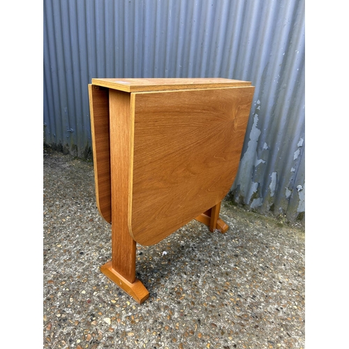 190 - A slim teak gate leg table