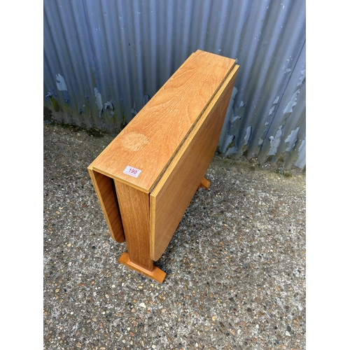 190 - A slim teak gate leg table