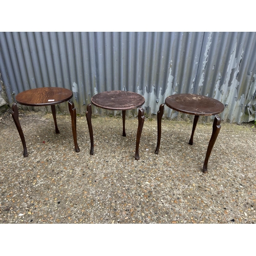 200 - A set of three oak stacking occasional tables