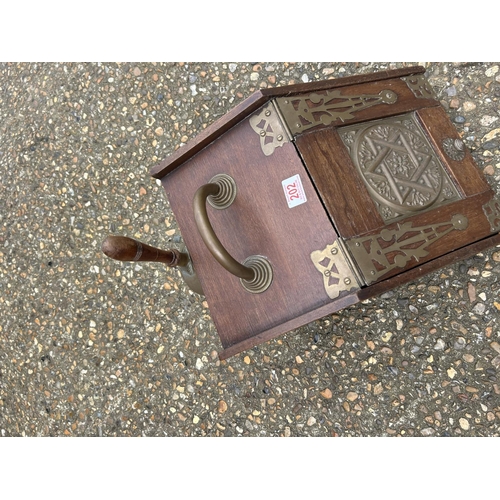 202 - A mahogany coal box with liner and  scoop