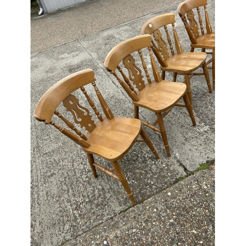 206 - A set of four farmhouse style pine chairs