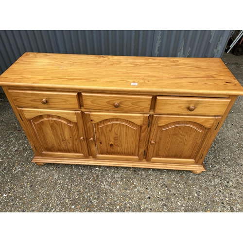 212 - A pine three drawer sideboard 150x45x85