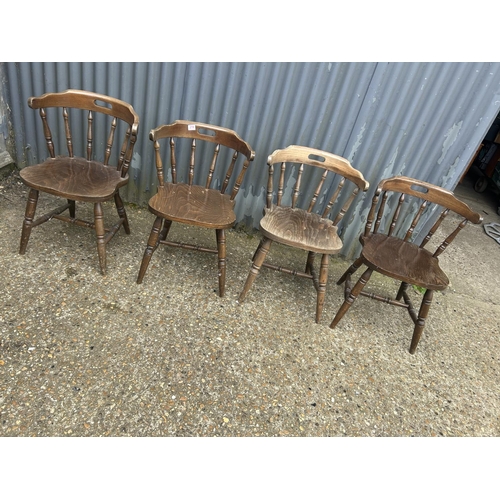 218 - A set of four smokers bow back pub chairs