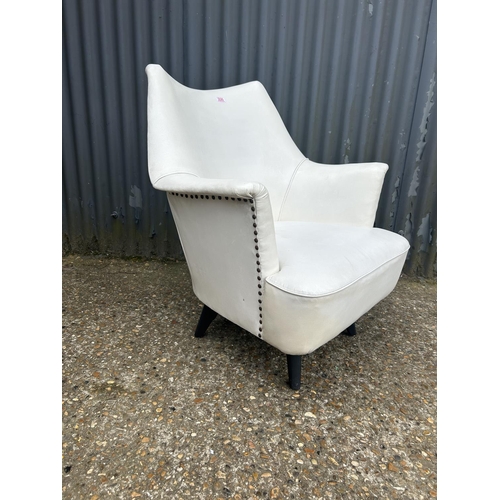 219 - A mid century white vinyl swivel chair