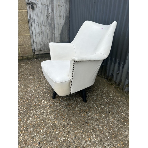 219 - A mid century white vinyl swivel chair