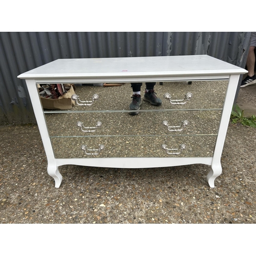 224 - A modern white painted chest of drawers with mirror glass fronts 95x45 x69