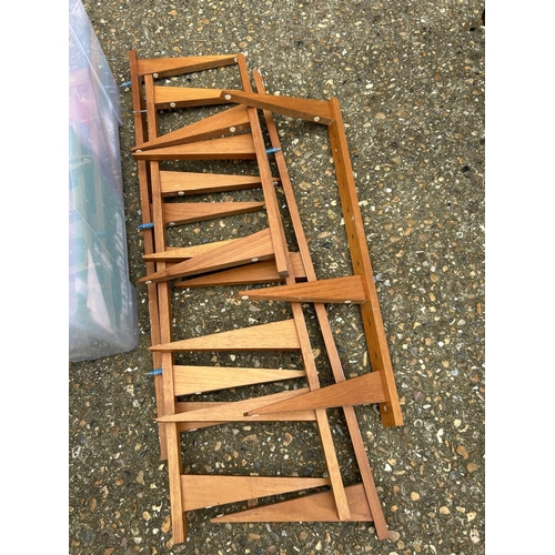 225 - A mid century teak and teak effect wall mounting bookshelves