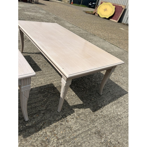 229 - A large limed ash coffee table 136x66 together with two smaller matching occasional tables