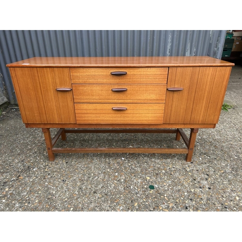 240 - A mid century teak sideboard by SCHRIBER 136x40x74