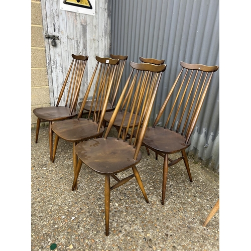 243 - A set of six dark ercol stick back chairs