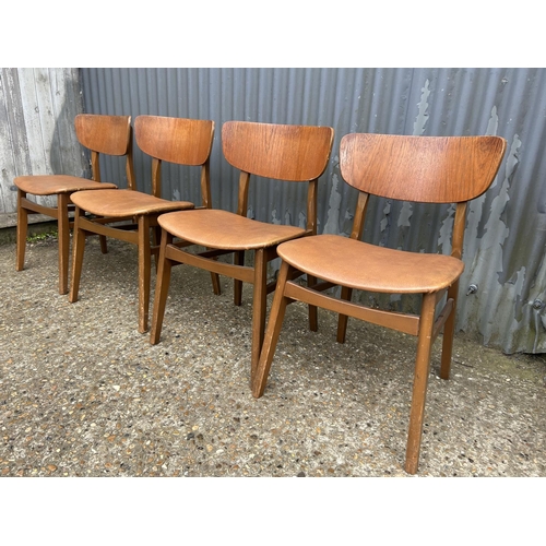 246 - A set of four retro teak chairs