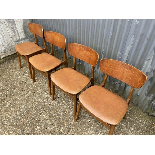 246 - A set of four retro teak chairs