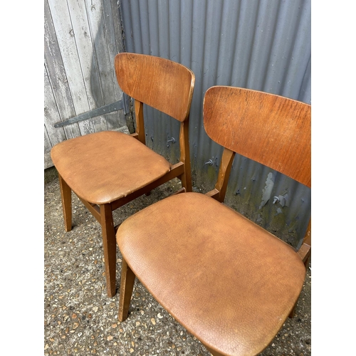 246 - A set of four retro teak chairs