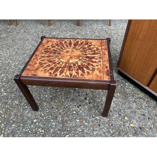 247 - A mid centuey teak record cupboard together with a small tile top coffee table