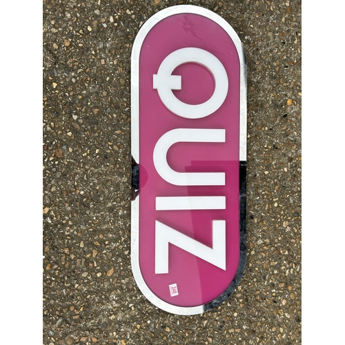 248 - A pink Quiz sign