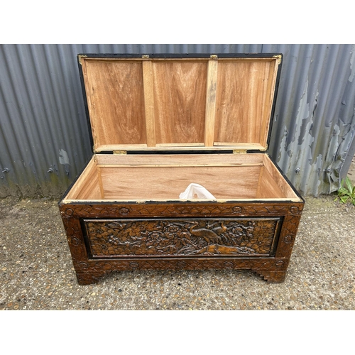 250 - An oriemtal carved camphor wood blanket box 100x50x55