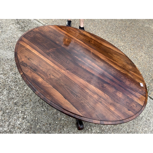 251 - A victorian rosewood tilt top oval loo table 108x138