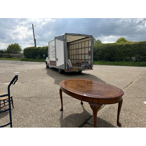 252 - A mahogany Oval Office writing table with brown leather top  168x108