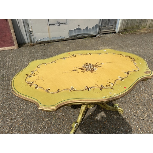 254 - An ornate painted dining table 170cm long