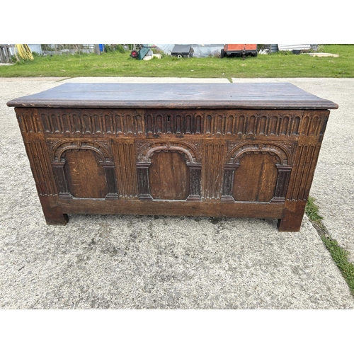 267 - A carved oak blanket box chest 130x56x60