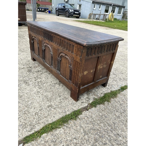 267 - A carved oak blanket box chest 130x56x60