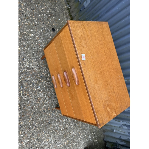 28 - A teak chest of drawers 68x37x72