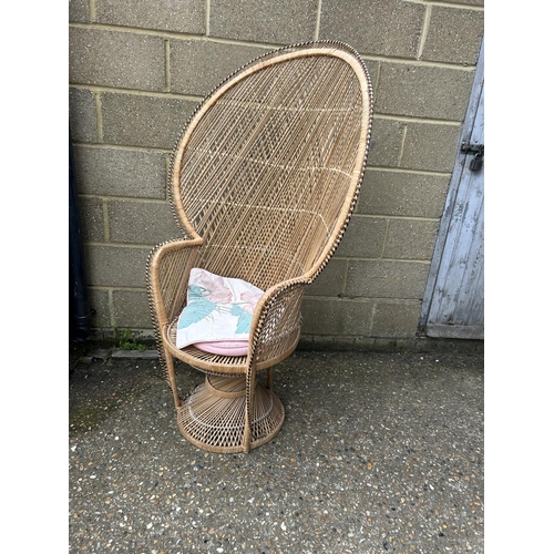 31 - A mid century wicker chair