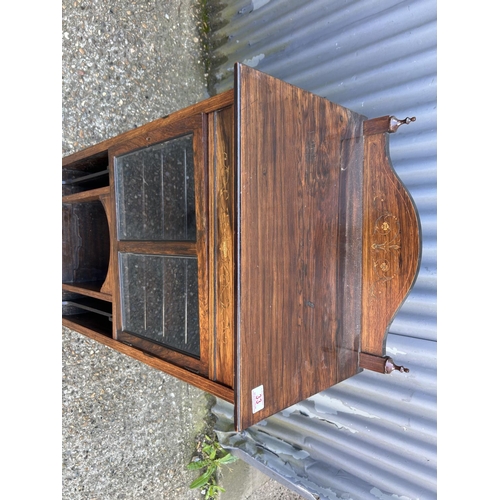 33 - A Victorian rosewood music cabinet