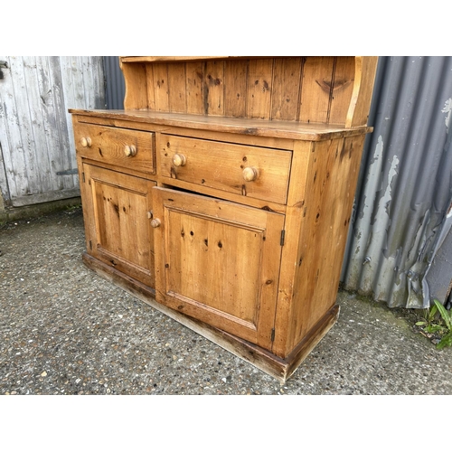 37 - A antique pine dresser with glazed to over two drawer and two door base 140x52x208