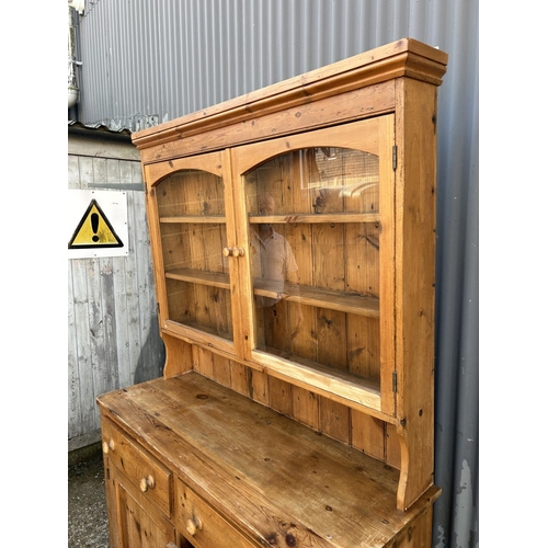 37 - A antique pine dresser with glazed to over two drawer and two door base 140x52x208