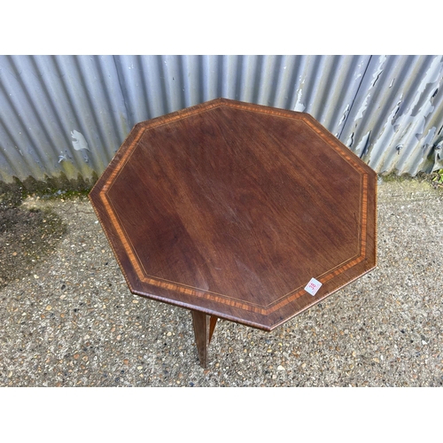 38 - An Edwardian octagonal occasional table 77cm diameter