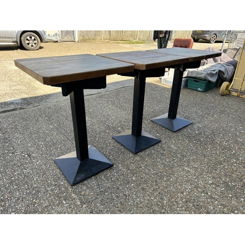 41 - Three iron based pub tables with thick beech wood tops 62x62x90