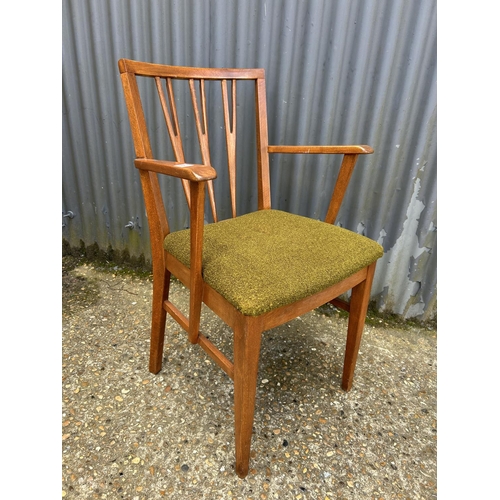 49 - A mid century teak desk carver chair