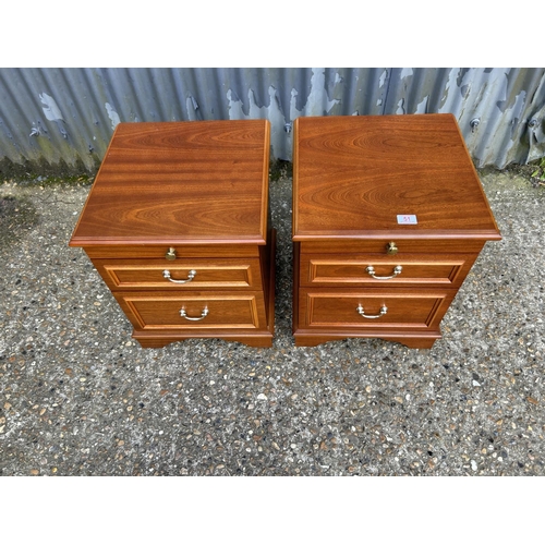 51 - A pair of stag bedside chests of two