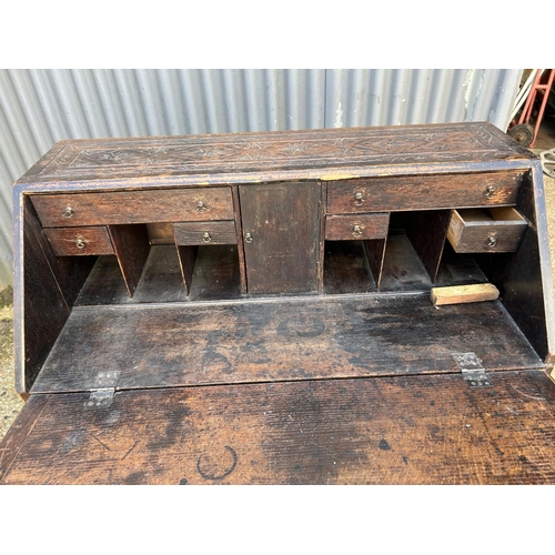 56 - A antique carved oak bureau 92x50x115