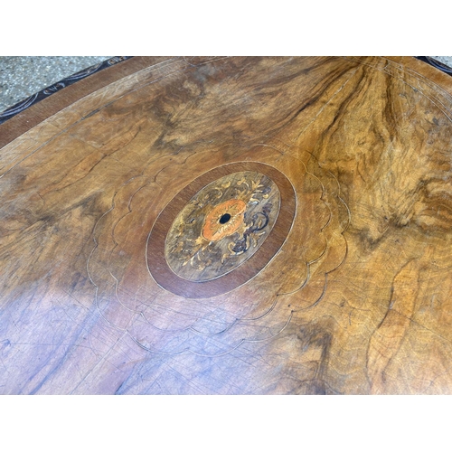 59 - A victorian walnut oval  tilt top breakfast table 140x100