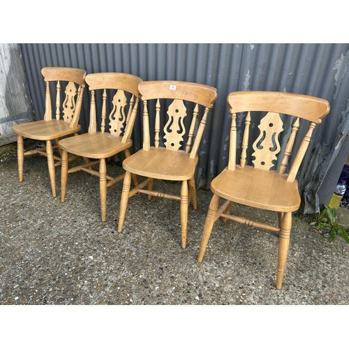 68 - A set of four pine kitchen chairs