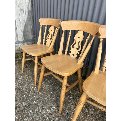 68 - A set of four pine kitchen chairs