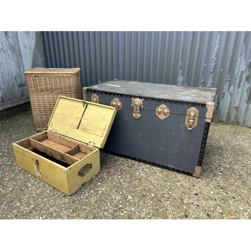 83 - A very large trunk, wooden tool box and a wicker basket containing wool