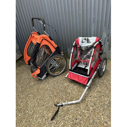 89 - A trailer bike and all terrain push chair