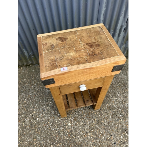 92 - A butchers block on  pine stand with two way drawer 54x40x90