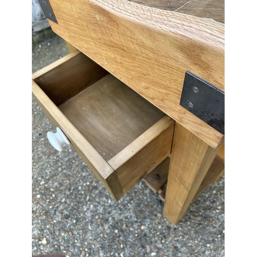 92 - A butchers block on  pine stand with two way drawer 54x40x90