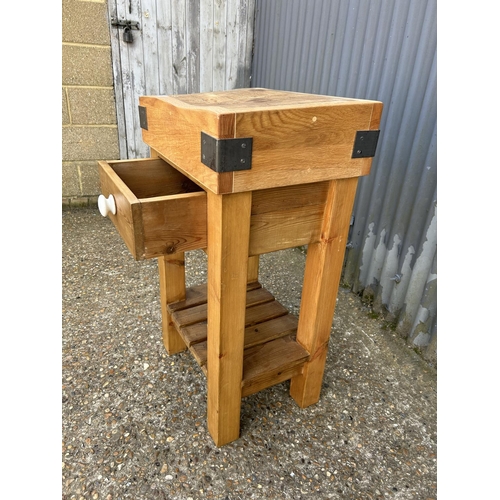 92 - A butchers block on  pine stand with two way drawer 54x40x90